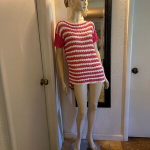 Hand wash gently and lay flat to dry do not wring.